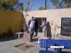 Ken McDonald and Gerry Westgard hard at work laying bricks