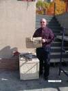 Mayor St. Onge with the contents of the cornerstone
